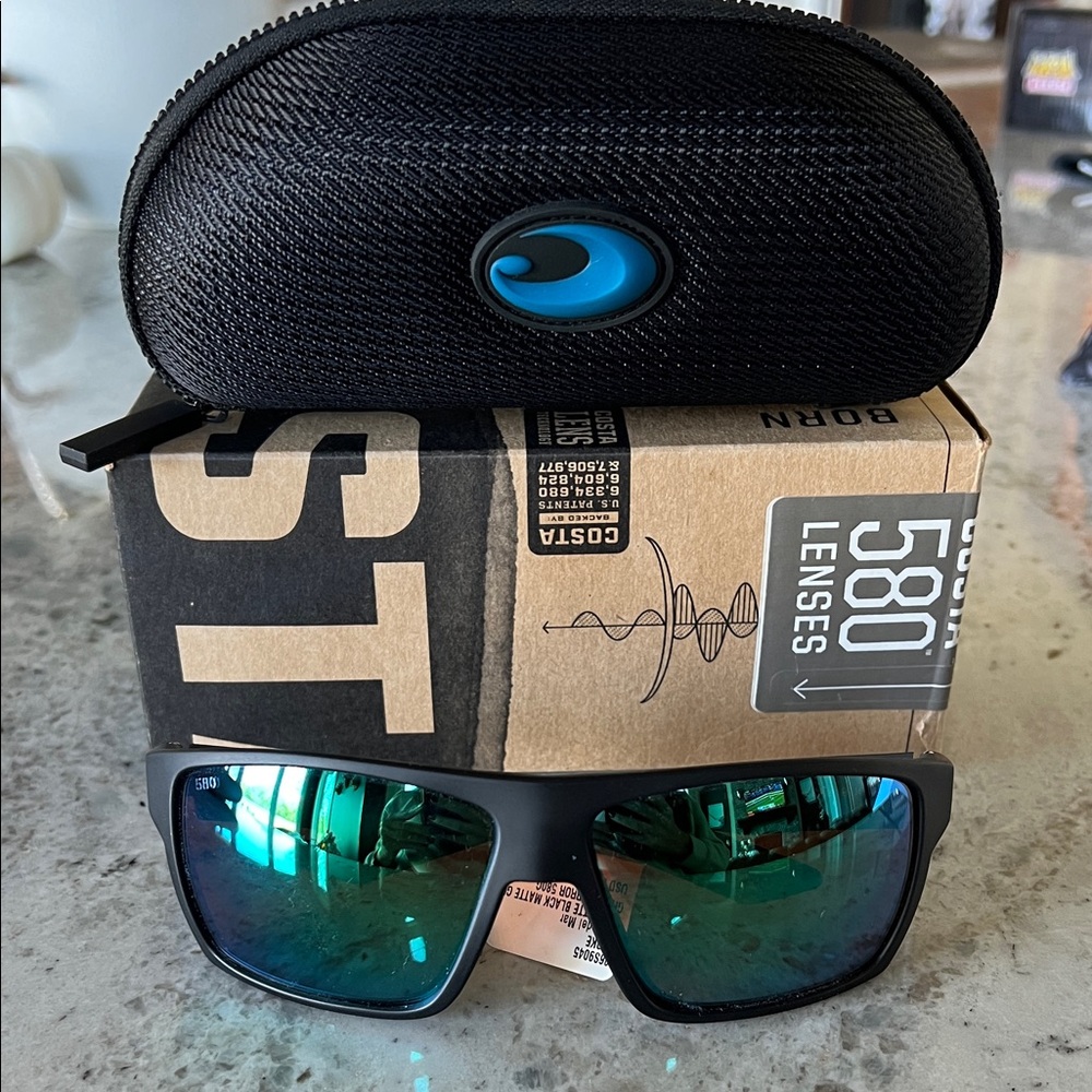 Costa Black Frames with Reflective Green Lenses